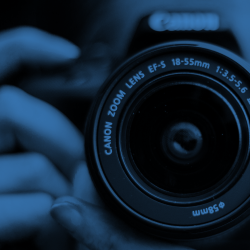 A person taking a photograph
